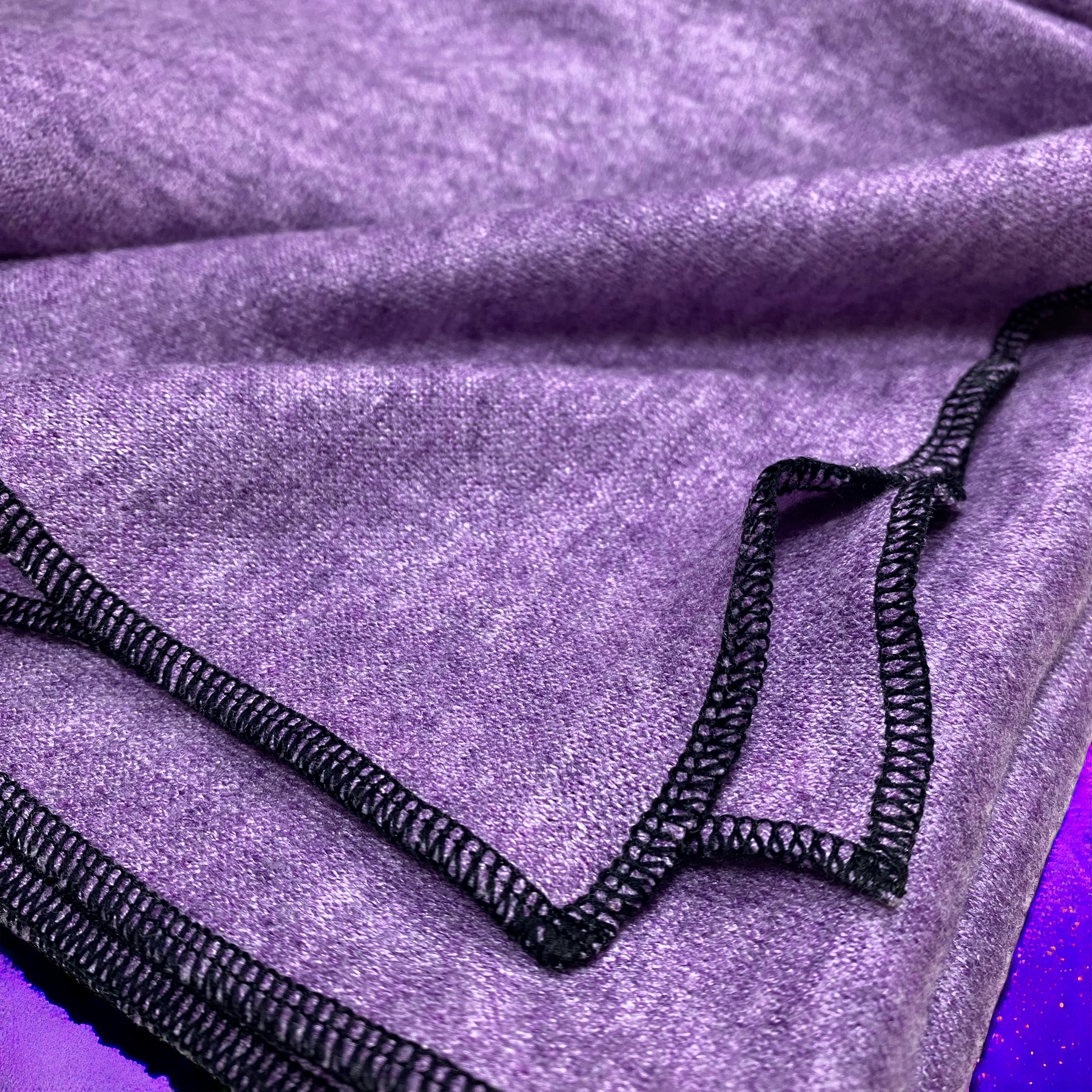 Poncho  Lila / Schwarz