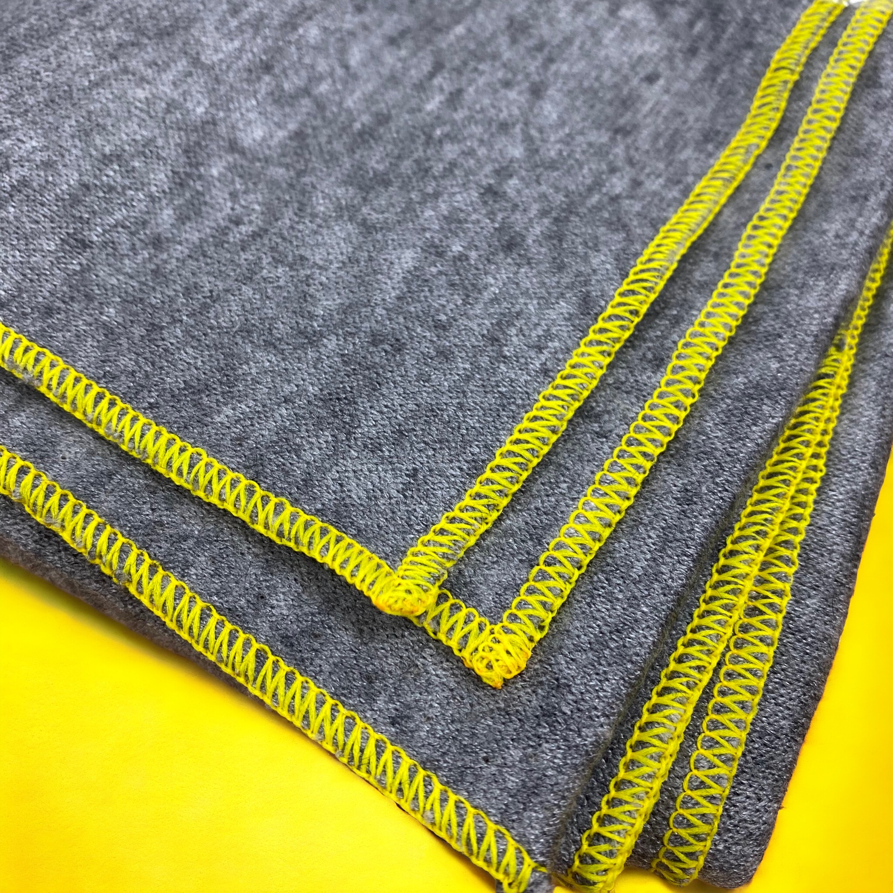 Poncho  Grau / Neongelb